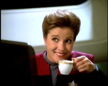 Captain Janeway holding her coffee cup
